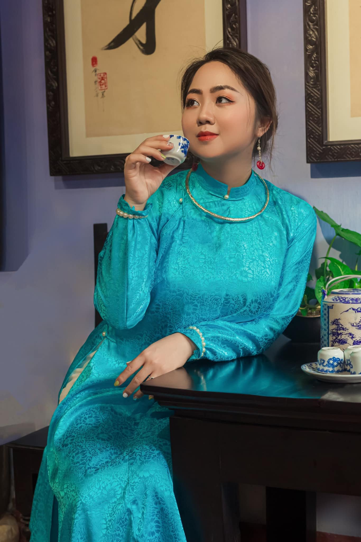 Full length view of an Ao Dai showing its long silhouette
